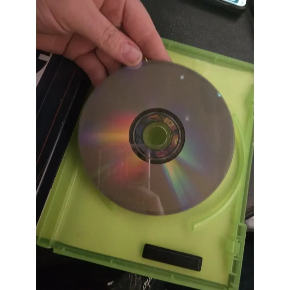 Pre-owned Xbox 360 game with original case, disc, and Project Sunburst insert.
